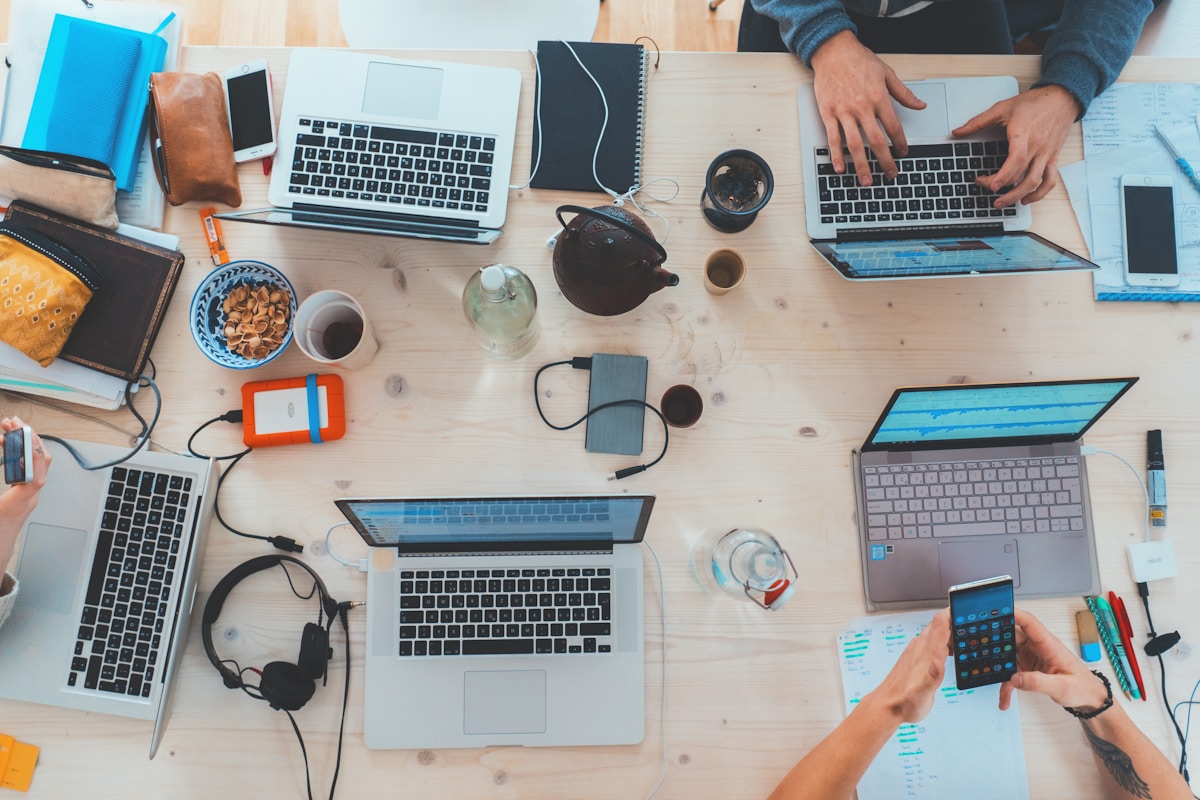 Desk with tablet, pen, and coffee